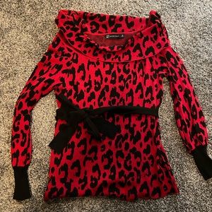 New, never worn, no tags. New York & Company Women’s sweater with tie belt